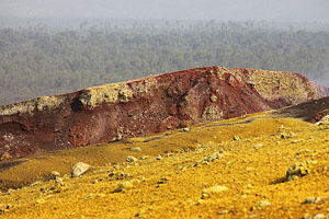 Nyamuragira Volcano primary site of 2011 eruption. Fissures, sulphurous yellow fumarolic deposits, iron-rich red deposits