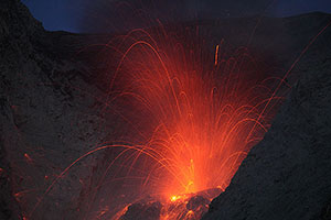 Close-up of strombolian eruption, Batu Tara volcano, Indonesia