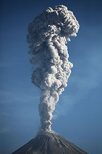 Tall ash cloud following explosive eruption of Colima volcano