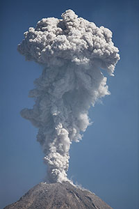 Tall ash cloud from Colima volcano, Mexico