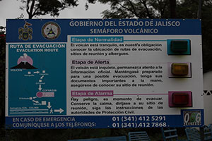 Warning sign with light signals near Colima Volcano, Mexico
