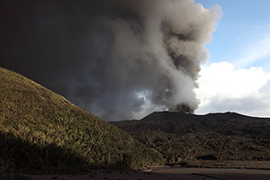 Dukono volcano, ash and meteorological clouds mixing