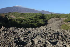 Etna Volcano, summit region with solidified lava flow in foreground