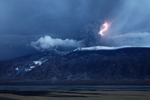 Eyjafjallajökull volcano erupting with lightning in ash cloud, iceland 2010