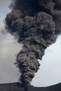 Tall dark ash cloud erupting from Fogo Volcano, 2014