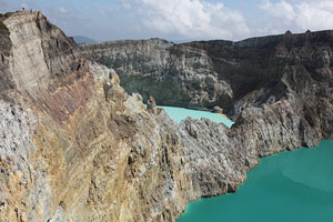 Kelimutu volcano, colourful crater lakes, weathered reddish-yellow cliff, Flores, Indonesia