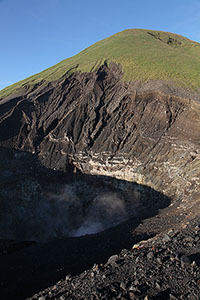 Portrait orientation image of Lokon-Empung Volcano with active Tompaluan Crater