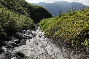 Trail to Lokon-Empung volcano, Mahawu in distance