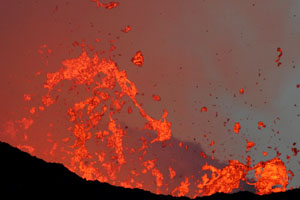 Nyamuragira Volcano eruption 2011 / 2012 - lava bombs hurled above crater rim