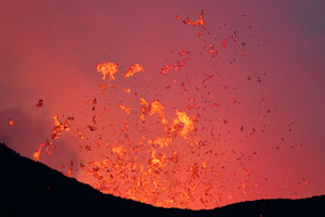 Nyamuragira Volcano eruption 2011 / 2012 - glowing lava bombs during blue hour