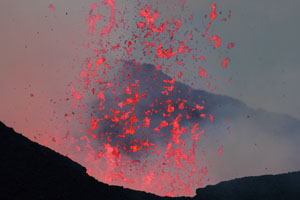 Nyamuragira Volcano eruption 2011 / 2012 - glowing lava bombs being ejected from crater
