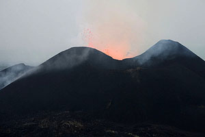 Nyamuragira Volcano eruption 2011 / 2012 - secondary eruption site, evening view with weak incandescence visible