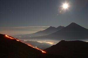 Pacaya Volcano MacKenney Cone.  Nighttime eruption lava flows.