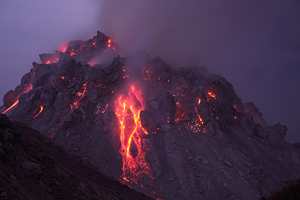 Rerombola lava dome glowing at night, Paluweh volcano