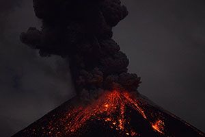 Reventador volcano, Ecuador, Nighttime Eruption, Lava bombs, Ash Cloud