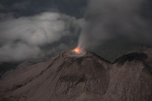 Night view of Santiaguito Volcano Caliente Vent from Santa Maria with eruption