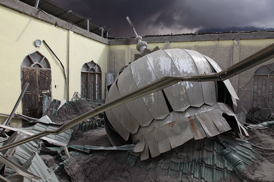 Collapsed roof of Mosque resulting from ashfall, Sinabung volcano, Indonesia