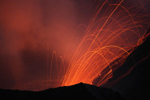Suwanosejima volcano, nighttime strombolian eruption O-take crater, Sakuchi caldera